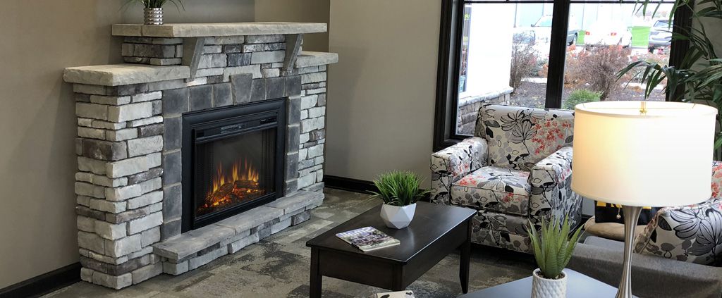 Building a fireplace with manufactured stone veneer