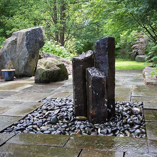 bubbling water columns made from stone